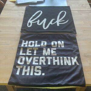 Pillow shams with writing.